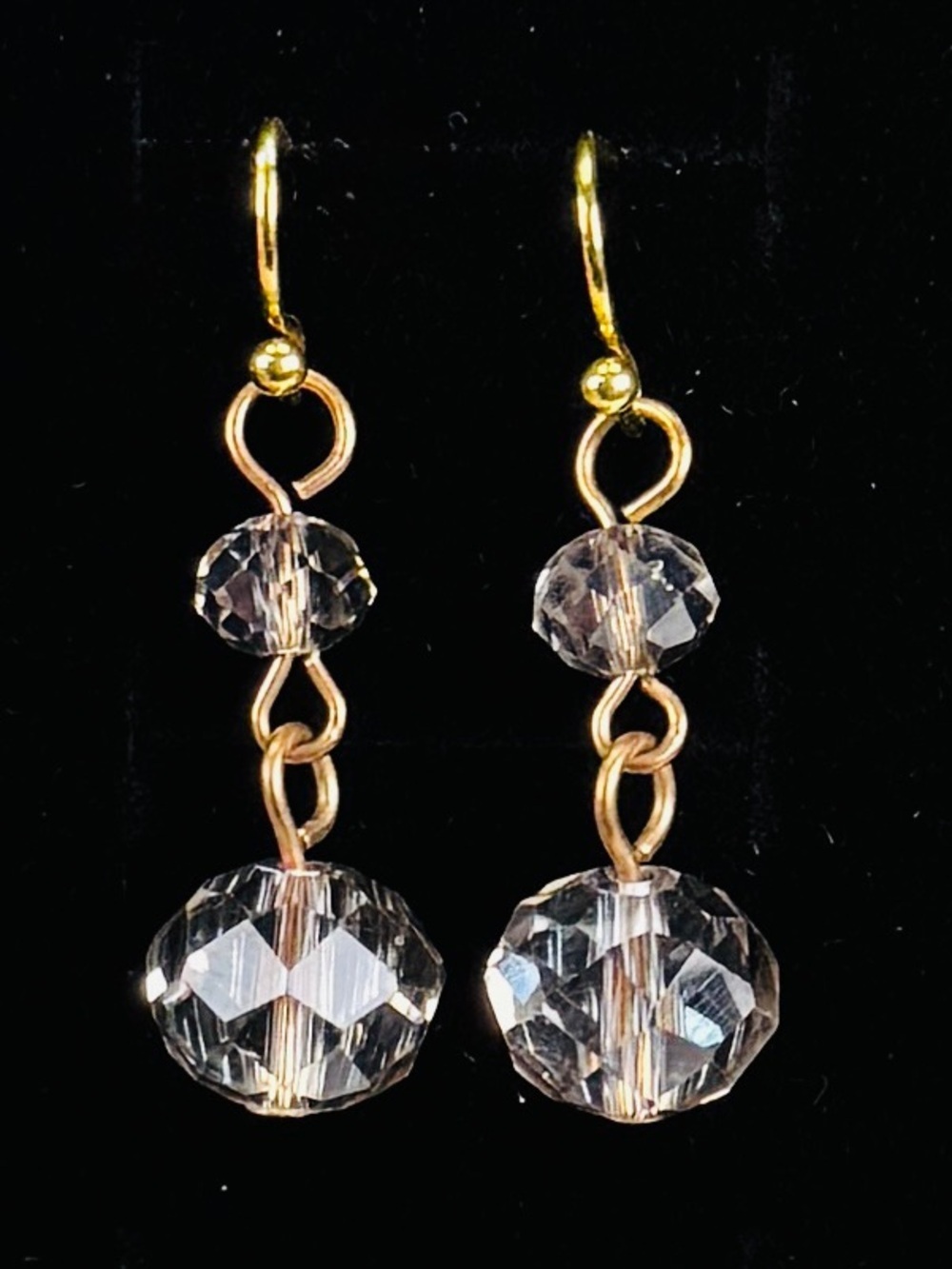 Lightweight, clear reflective smoky bead goldtone pierced earrings